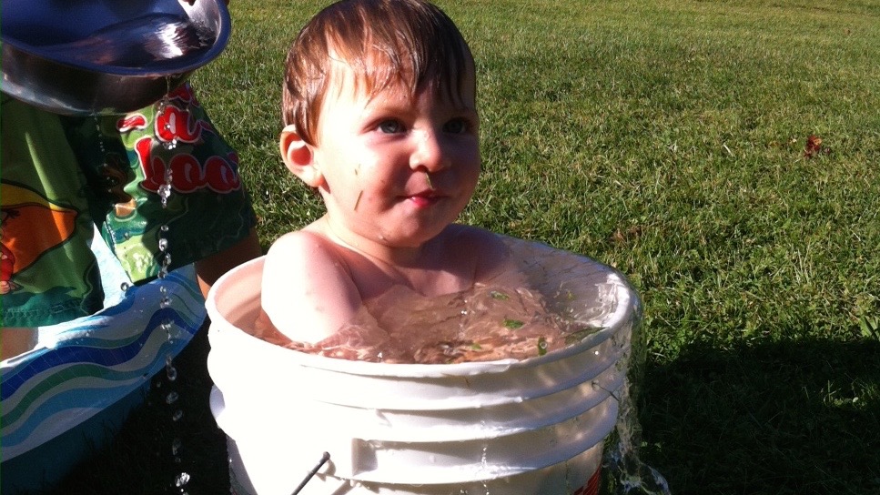 Water is one of those worrying situations that we'd prefer to discourage. Here we found Lucas in a bucket of water.
