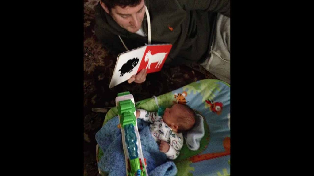 It's important to start reading young. Start with baby books that show pictures with contrasting colors.