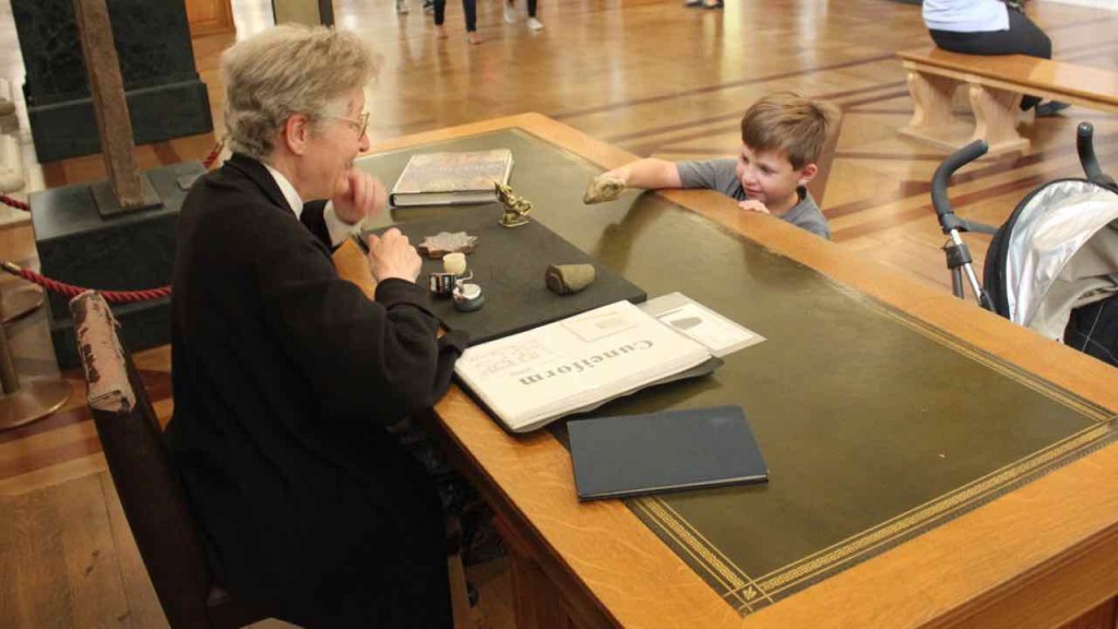 Museums provide 'more input' for children. Here my eldest examines ancient artifacts at the British Museum.